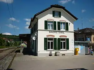 Two-story building with gabled roof