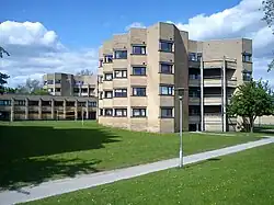 A 4 story irregular brick building