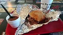 Image 2Pulled pork sandwich and baked beans (Cabot) (from Culture of Arkansas)