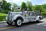 A white 1940s firetruck