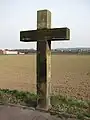 Stone cross (1853) in the high street