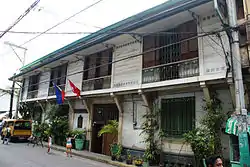 Opened ventanillas at the Bahay Nakpil-Bautista, boasting their lyre-shaped grilles.