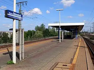 Island platform with covered waiting area