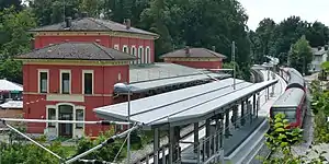 Island platform next to station building