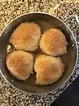 baked dumplings in their baking dish.