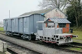 Baldwin 50 hp gasoline mechanical locomotive here converted to standard-gauge and preserved in France.