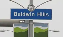 Baldwin Hills neighborhood sign  located at the intersection of La Brea Avenue and Stocker Street