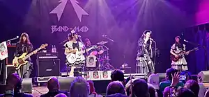 Band-Maid performing at House of Blues in Dallas, October 2022 (L-R: Misa, Miku Kobato, Akane Hirose, Saiki Atsumi, Kanami Tōno)