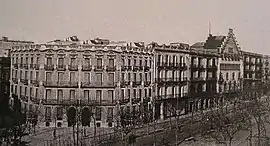 terrace of uniform houses broken only by the pointed roof of the Casa Amatller