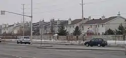 A group of homes in Barrhaven on Woodroffe Avenue, between Fallowfield Road and Earl Mulligan Drive