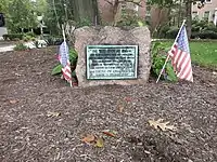 Photo shows an historical marker at the Lutheran Theological Seminary at 7301 Germantown Ave, Philadelphia, PA 19119. The marker reads, "On this spot at dawn on the fourth day of October Seventeen Hundred Seventy Seven the American troops under General Washington attacked the British troops thus beginning the Battle of Germantown. Erected by the class of 1919."