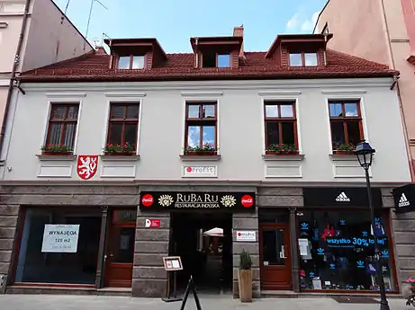 Nr.27, main elevation and entrance to the backyard