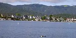 A row of backyard boat docks along Del Oro Lagoon in Bel Marin Keys