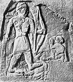 Relief of Tardunni, a possible Lullubi ruler, also holding weapons and trampling foes, with an inscription in Akkadian.