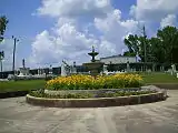 Decorative fountain surrounded by flowers