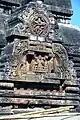 A double pediment depicting a dancing Shiva