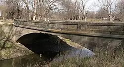 An image of an old concrete bridge