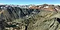 North aspects of Black Mountain (left) and Excelsior Mountain (right, reddish) seen from Dunderberg Peak. Mount Conness centered on the distant horizon.