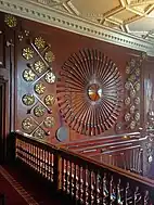 The great hall. The weapon display includes targes and muskets which were used at the Battle of Culloden.