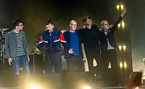 Mike Smith (far right) on stage with Blur at Wembley Stadium 2023