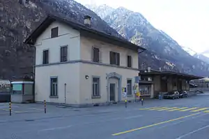 Three-story building with gabled roof