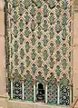 Zellij on the minaret of the Bou Inania Madrasa in Fez (14th century), with mosaic panels below and green sgraffito tiles above