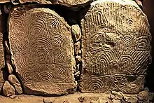 Decorated slabs from the Gavrinis passage (replica in Bougon Museum)