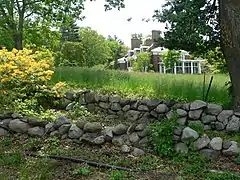 Estate house with stone fences