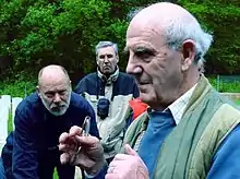 Martin Middlebrook speaking on a tour of a cemetery where war dead from the Battle of the Somme are buried, 2014.