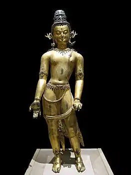 Room 33 - Statue of Bodhisattva Avalokiteshvara, gilded bronze. Nepal, 16th century AD