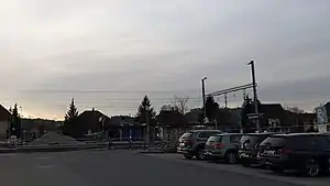 Parking lot in front of platform with shelter