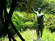 Athlete, sculpture in garden by Rudulph Evans (1915)