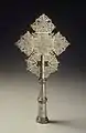 Brass, latticework processional cross  (socketed for staff) latticework reminiscent of Celtic knot-work, Amhara Region, mid 20th century.