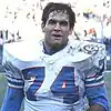 Headshot of Bruce Matthews on a football field wearing his uniform but no helmet