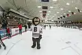 Bruno, Brown's mascot, stands on the ice inside Meehan