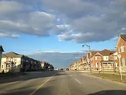 Looking East on Bur Oak Avenue, by Fred McLaren Boulevard.