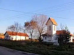 Busenje - center of village with new Catholic church 1993.