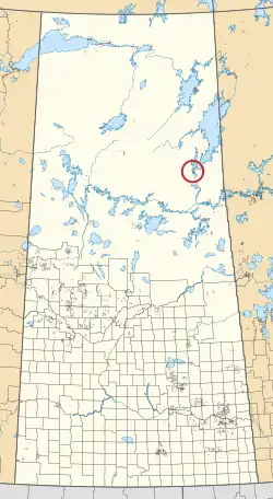 A map of the province of Saskatchewan showing 297 rural municipalities and hundreds of small Indian reserves. One is highlighted with a red circle.