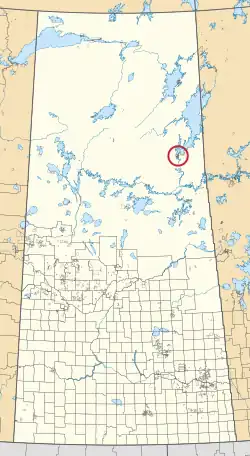 A map of the province of Saskatchewan showing 297 rural municipalities and hundreds of small Indian reserves. One is highlighted with a red circle.