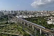 CR300AF aerial view near at Haikou East station.