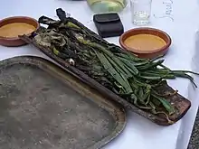 Roasted calçots with romesco sauce for dipping