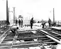 Workers on the bridge after the fire