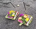 With incense at a beach in Canggu