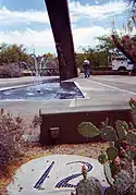 Detail of the 12 o'clock marker with fountain repairman