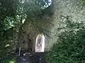 Entrance, to the left-ruins of the barbican