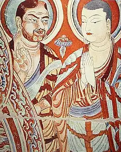 A blue-eyed Central Asian monk teaching an East-Asian monk, Bezeklik, Turfan, eastern Tarim Basin, China, 9th century; the monk on the right is possibly Tocharian, although more likely Sogdian.