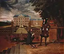 Charles accepts a pineapple from a kneeling man in front of a grand country house