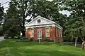 Charlotte Memorial Museum (formerly known as the Town Meeting House), which currently houses the Charlotte Historical Society.