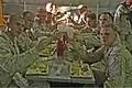 Marines of Combat Logistics Battalion 6, 2nd Marine Logistics Group, based out of Camp Lejeune, N.C., toast in celebration of their completion of the Integrated Training Exercise during their "Warrior Night" at Twentynine Palms, Calif., 6 June 2013.