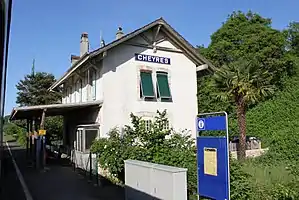 Two-story building with gabled roof